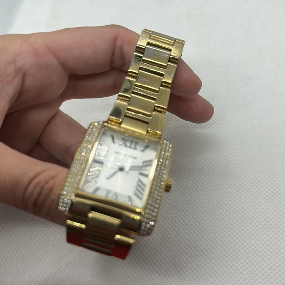 Michael Kors Emery Three-Hand Gold-Tone Stainless Steel Watch - Picture 3 of 4